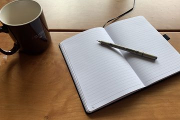 Journal and coffee mug